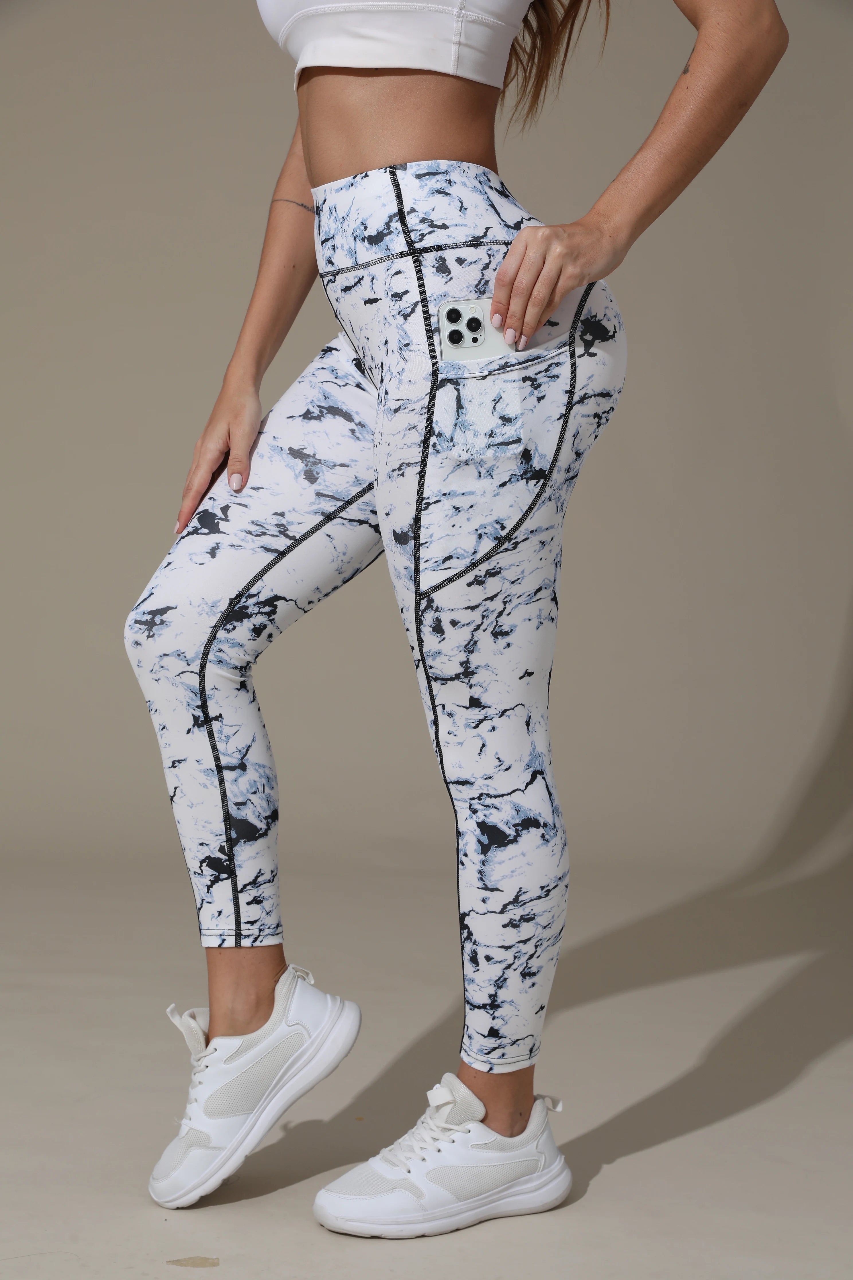 Printed women's high waistband pocket fitness pants paired with tight abdominal yoga pants, suitable for running, hiking, and sp