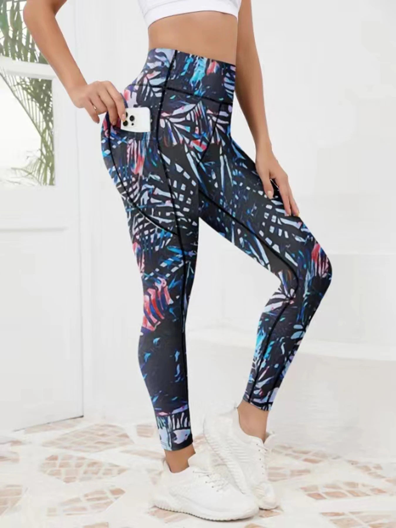 Printed women's high waistband pocket fitness pants paired with tight abdominal yoga pants, suitable for running, hiking, and sp